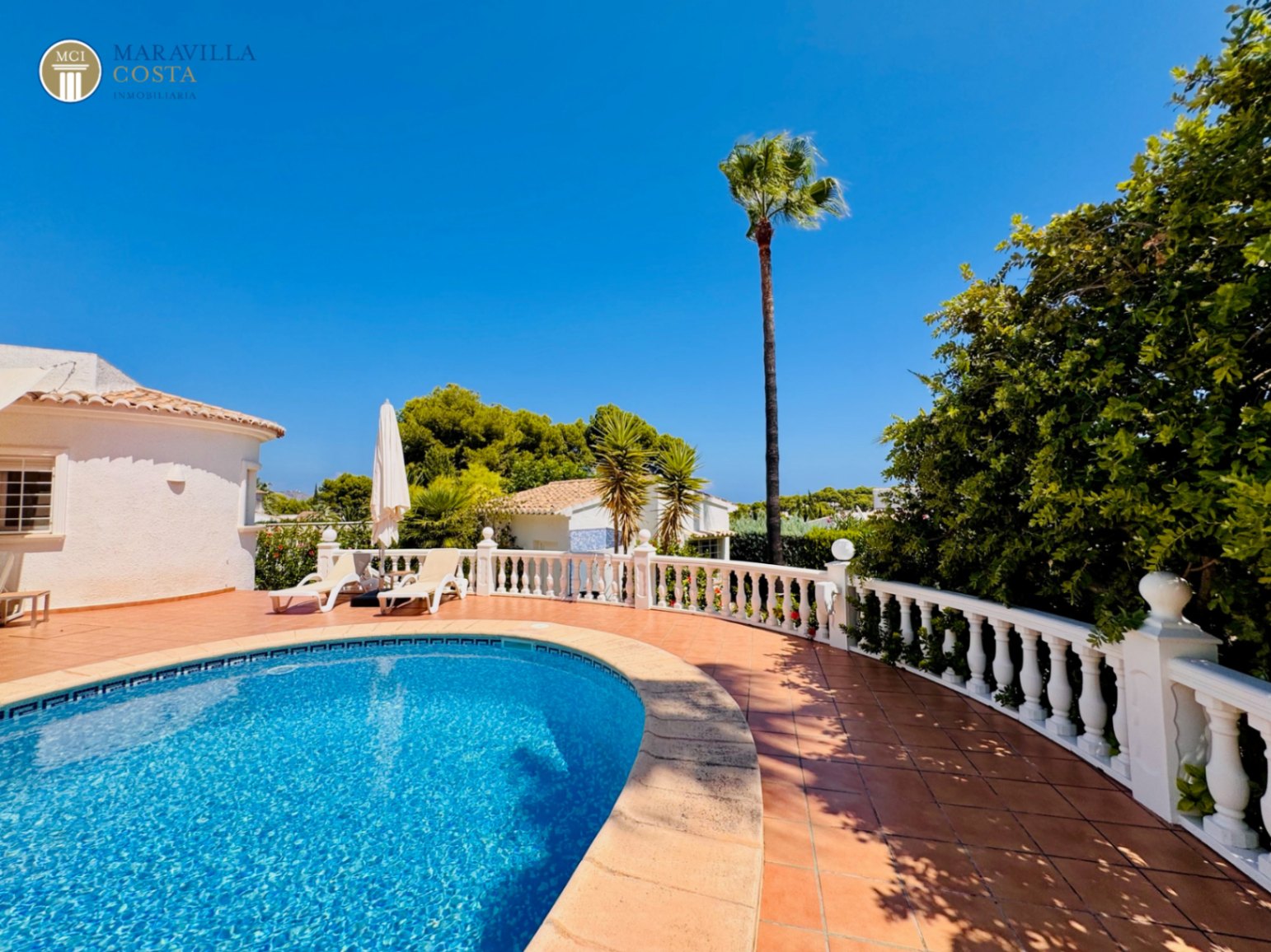 Stylish villa with sea views, guest house, and private pool area in Jávea.
