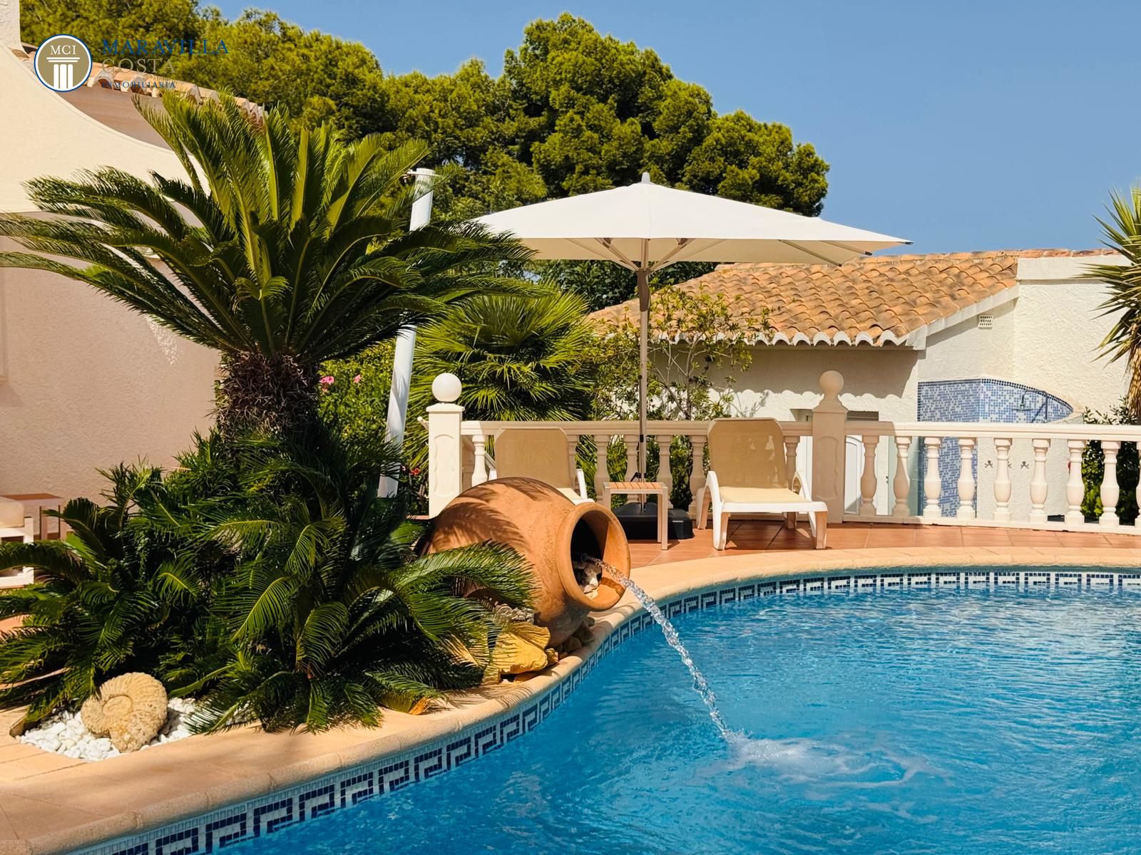 Stylish villa with sea views, guest house, and private pool area in Jávea.