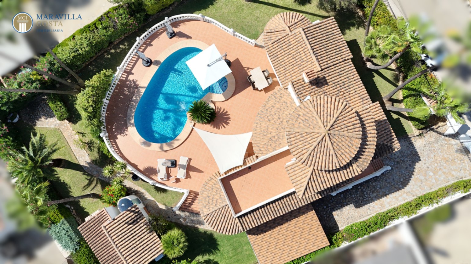 Stylish villa with sea views, guest house, and private pool area in Jávea.